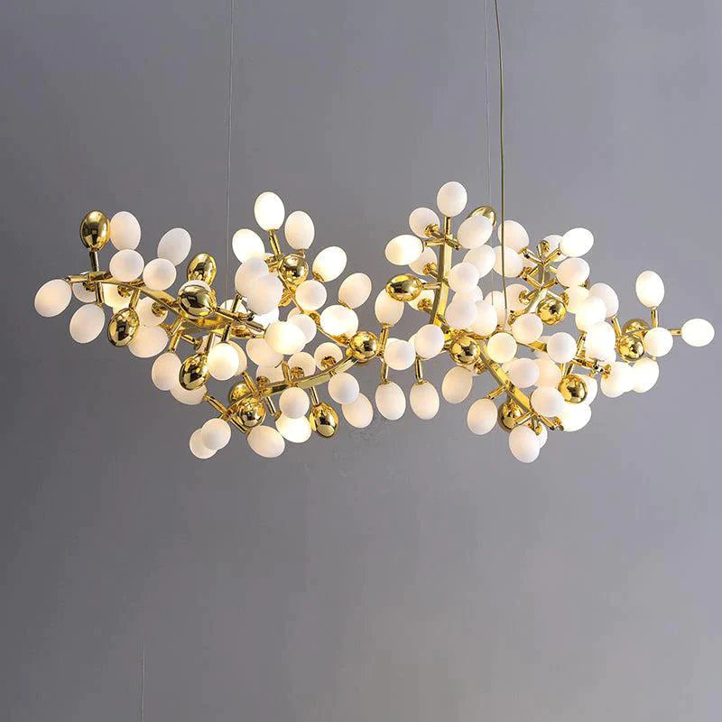 Post Modern Linear Grape Branch Chandelier Over Dining Table