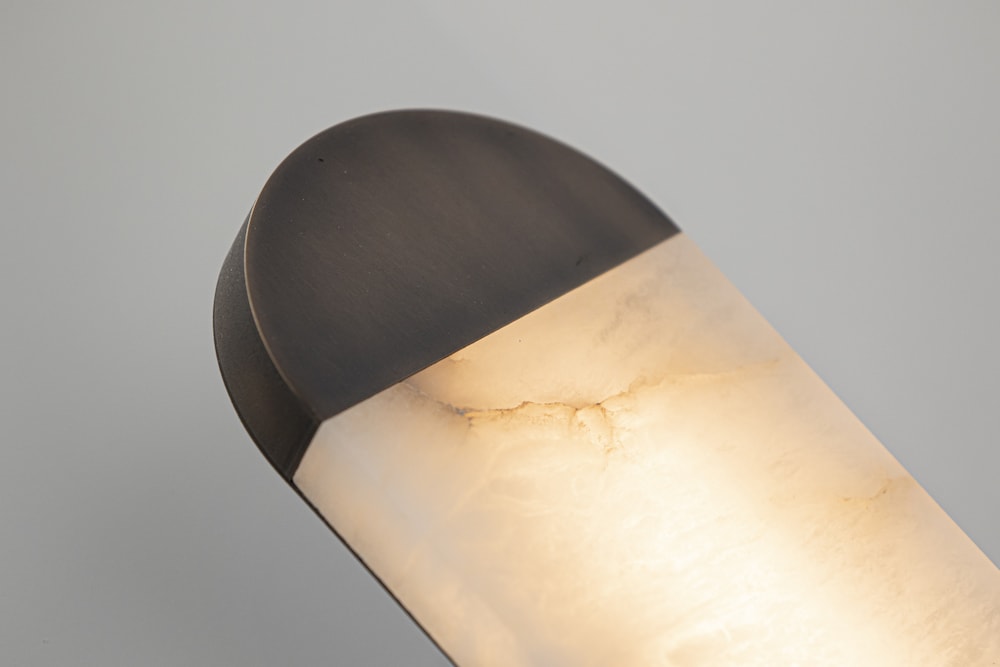 Ghost alabaster wall sconce