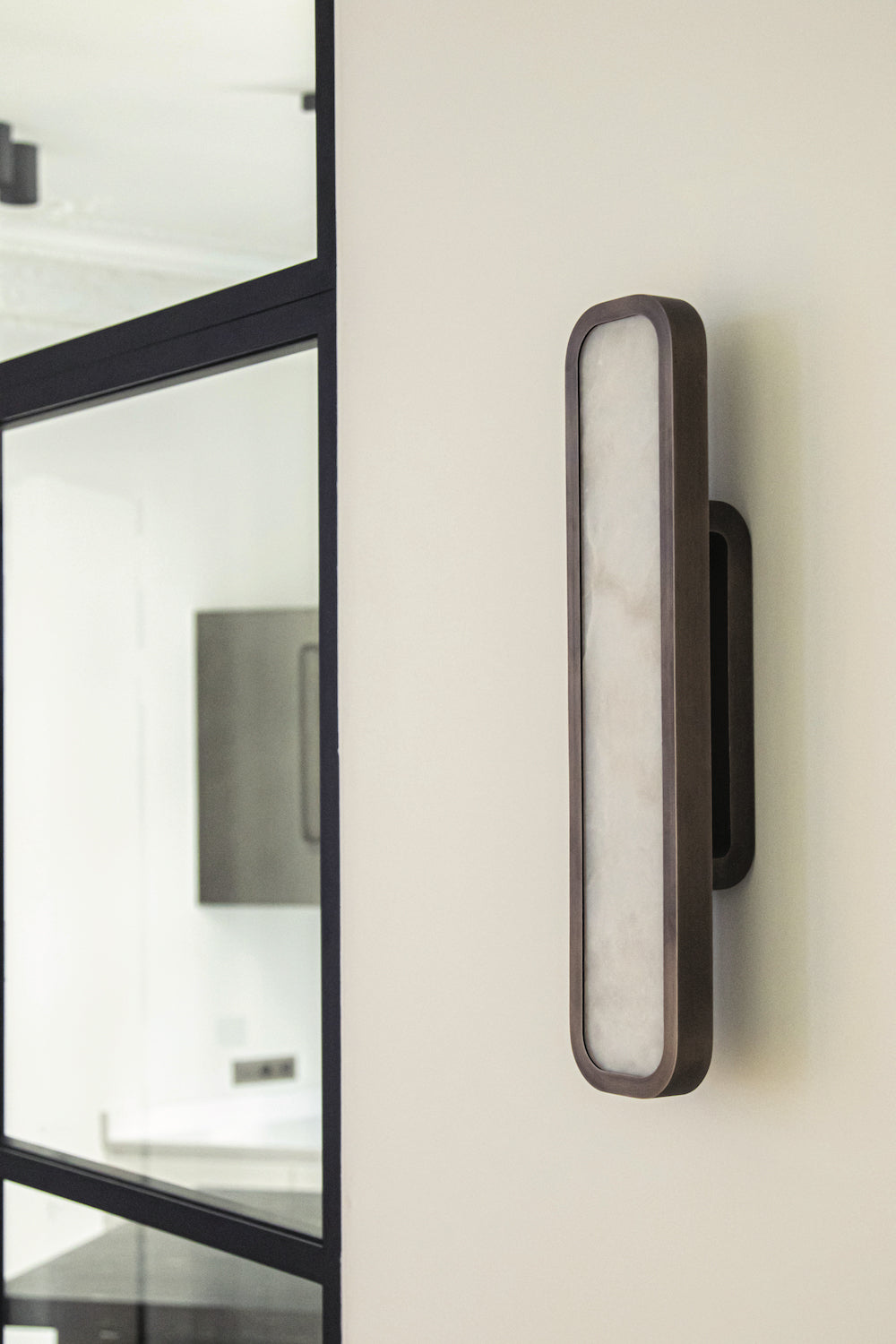 Hublot alabaster wall sconce